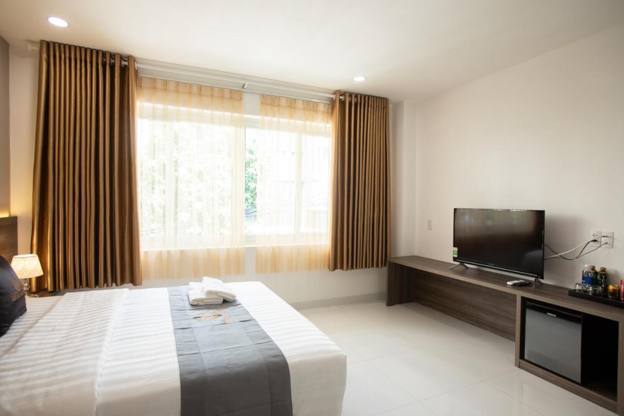 Hera Hotel Airport Хошимин Экстерьер фото